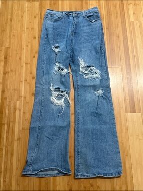 Wide-Leg Distressed Women's Jeans in Medium Blue